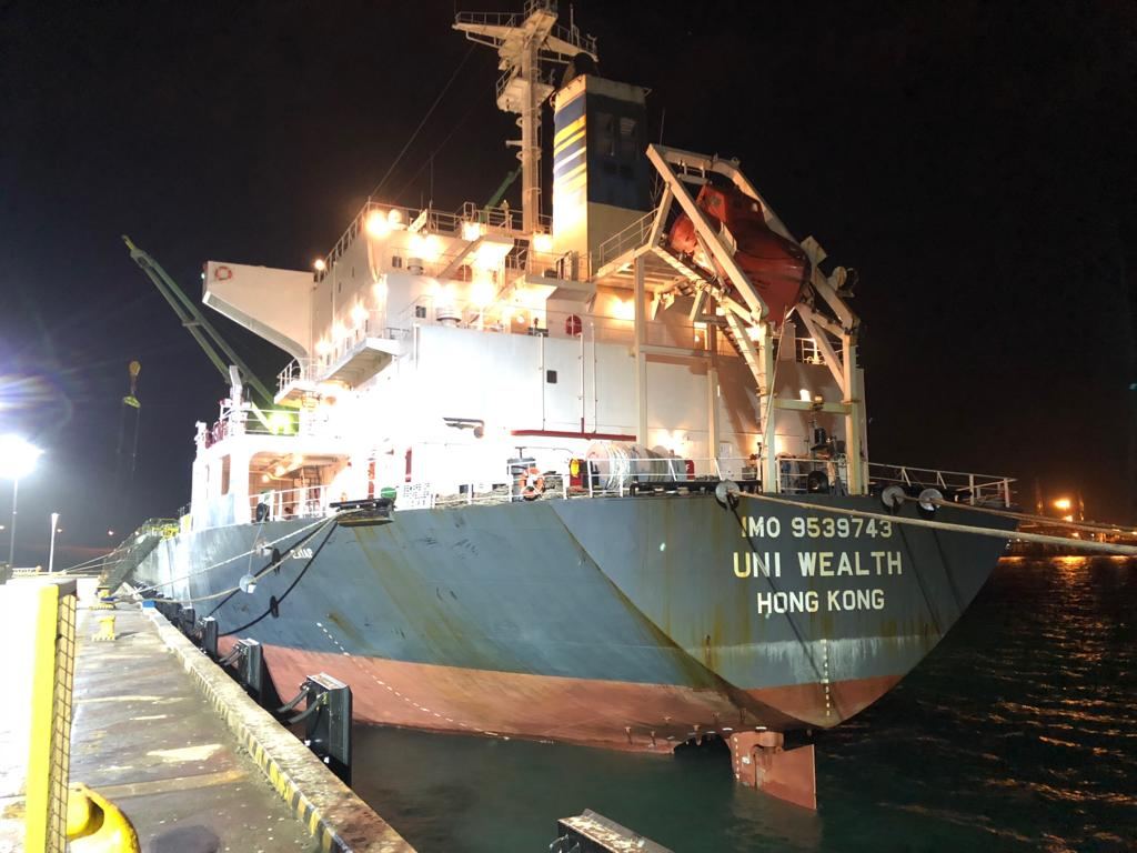 A THC Holding bulk shipment being loaded at night